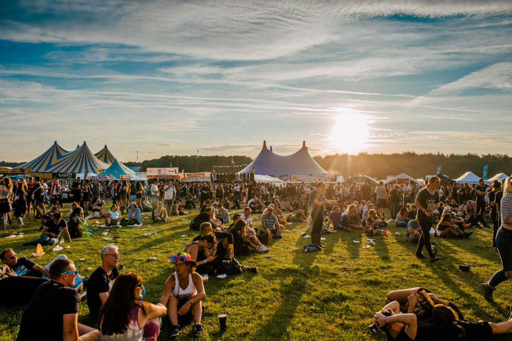 Crowds enjoying sunset at festival